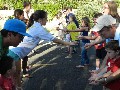 Water balloon toss starts